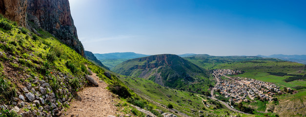 Green mountain landscape panorama looking from the Israel National Trail in the Galilee region of...