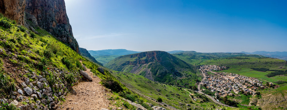 Green mountain landscape panorama looking from the Israel National Trail in the Galilee region of Israel
