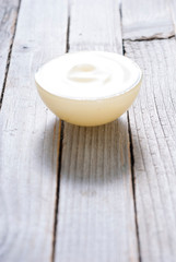 Cosmetic cream on old wood table