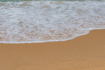 soft wave on a sandy beach