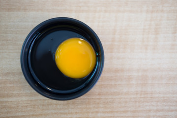 Fresh egg on small bow