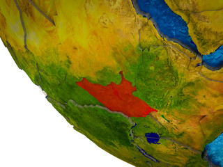 South Sudan on model of Earth with country borders and blue oceans with waves.
