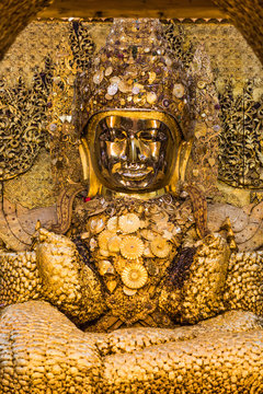 the golden buddha of Maha Myat Muni Pagoda temple Mandalay city Myanmar (Burma)
