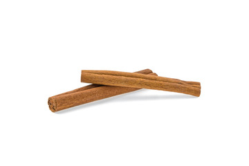 two cinnamon sticks isolated on white background