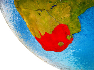 South Africa on model of Earth with country borders and blue oceans with waves.