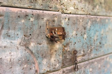 Old rusted lock on a wooden door (Pesaro, Italy, Europe)