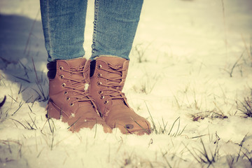 Woman wearing brown winter boots