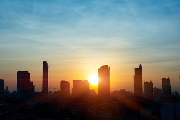 cityscape and sun reflection silhouette