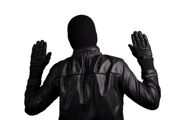 Thief from the back with arms raised, isolated