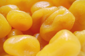 Bright and juicy pile of yellow sweet candied dried lemons.