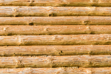 Wooden logs wall texture background with copy space