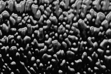 Patterned distorted glass close-up abstraction