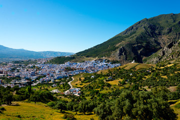 cityscape of famous blue town chefchaouen in rif mountains, morocco