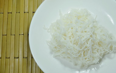 Thai rice noodles on white plate