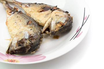 Fried or grilled mackerel fish white background Thai food