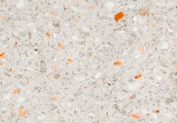 terrazzo flooring which has Orange rock Small or marble old. polished stone wall beautiful texture for background with copy space add text