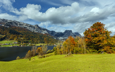 Splendid Alpine scenery in summer, Perfect sky Over the Amazing lake Grundlsee with famous, green Alpine Meadows. Wonderful Austrian alp landscape. Austrian alps in springtime. Awesome autumn in alps