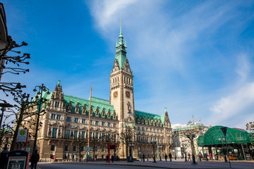 Fototapeta premium Hamburg City Hall building located in the Altstadt quarter in the city center at the Rathausmarkt square in a beautiful early spring day