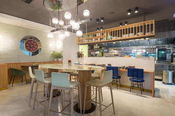 Fototapeta na wymiar Modern restaurant interior in city center