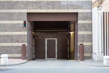 Closed gates of underground parking in a modern building