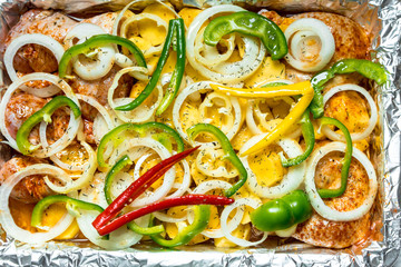 casserole of potatoes, peppers, onions and fresh chicken