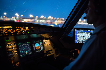 Commercial airliner airplane flight cockpit during takeoff