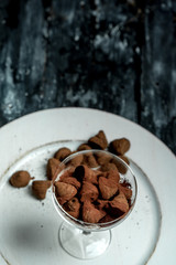 sweet, chocolate truffles and bitter cocoa on a romantic, dark background