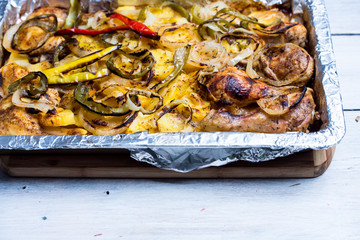 baked casserole of potatoes, peppers, onions and fresh chicken