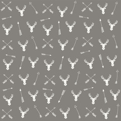 Vector seamless arrow pattern with deer heads. Hipster trendy background.