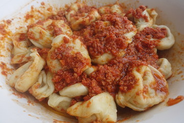 Tortellini, typical filled pasta dish from Italy, closeup view