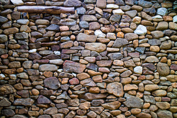 River stone wall