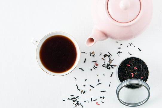 Top Down View Of Tea Pot, Tea Leaves And Tea Cup