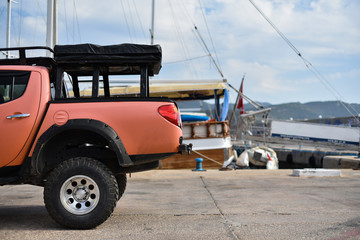 SUV pickup car on the sea pier