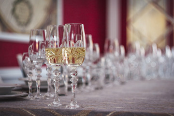 Two glasses of wine at the banquet table. Restaurant. Small depth of field