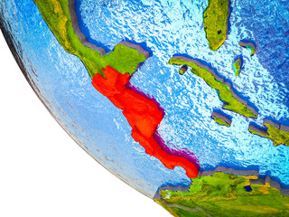 Central America on model of Earth with country borders and blue oceans with waves.