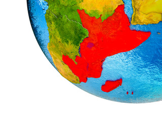 East Africa on model of Earth with country borders and blue oceans with waves.