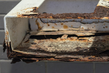 Blurred background with steel of rust. Rust stains.Surface rust on the white steel surface.