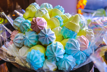 Multicolored candy close-up as background.