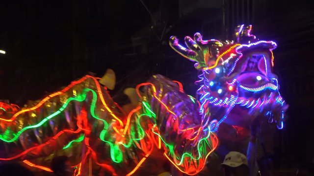 Chinese dragon performing at night.