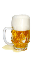 Mug full of beer with froth isolated on white background