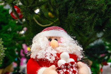 Santa Claus, a toy with gifts in their hands.