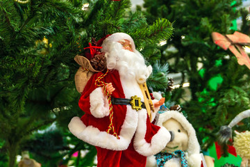 Santa Claus, a toy with gifts in their hands.