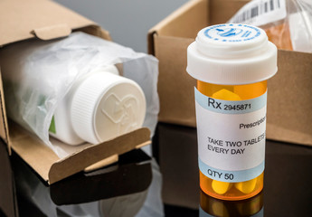 Several boxes with medicines in interior under prescipcion medica, conceptual image