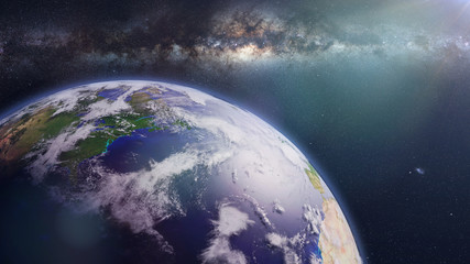 Fototapeta premium beautiful planet Earth lit by the Sun and the Milky Way galaxy 
