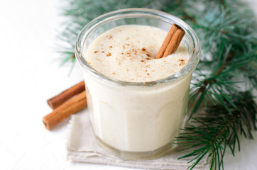 Eggnog, Traditional Christmas Drink, Cocktail with Cinnamon and Nutmeg for Winter Holidays