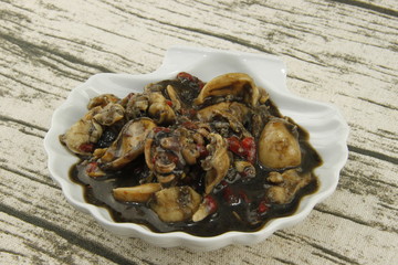 Encornets en tapas dans une coquille Saint Jacques