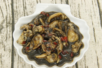 Encornets en tapas dans une coquille Saint Jacques