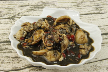 Encornets en tapas dans une coquille Saint Jacques