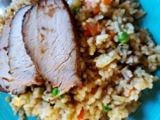 Fresh homemade Pork Fried Rice with lots of vegetables and flavor 