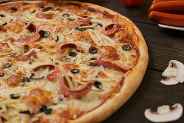 Pizza with Pepperoni Sausage and mushrooms